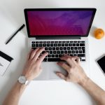 person using laptop computer